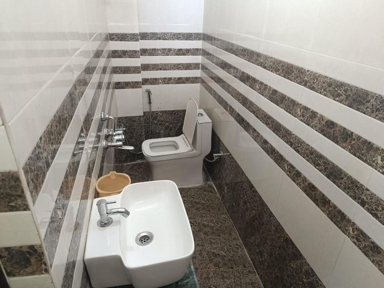 Jpm Guest House Váránaszi Kültér fotó